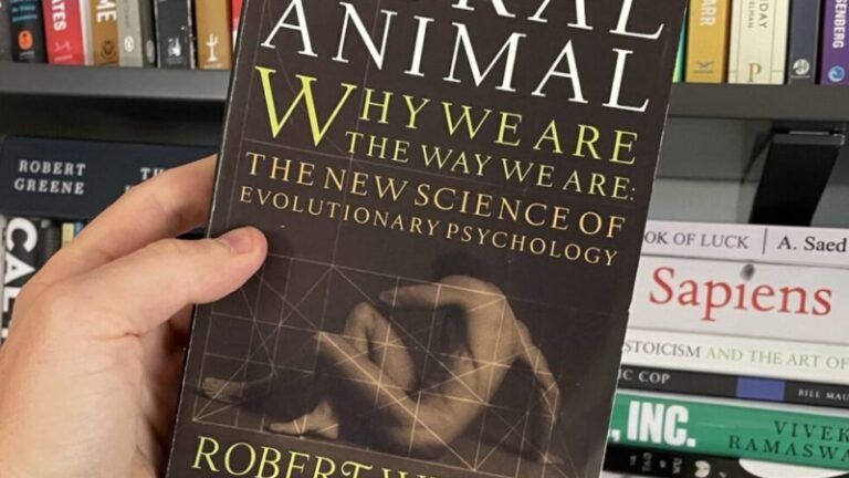 The Moral Animal by Robert Wright- Book Cover in front of a book shelf