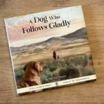 a dog that follows gladly by Phil Van Treuren